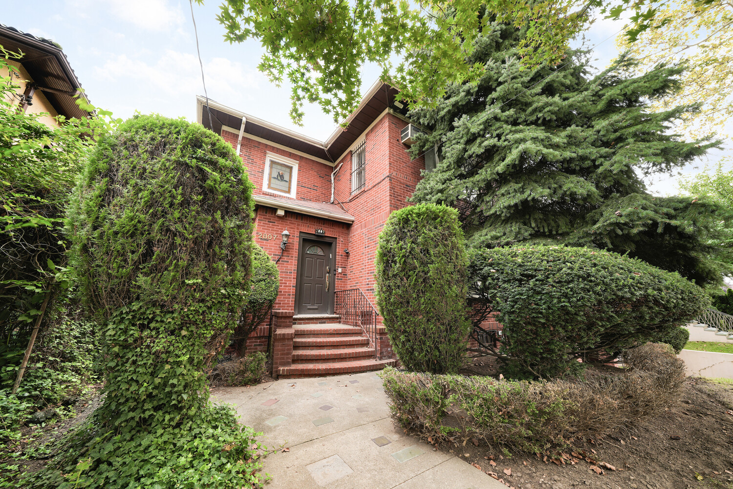 Brooklyn home photograph from network marketing materials, used as website artwork; availability not represented