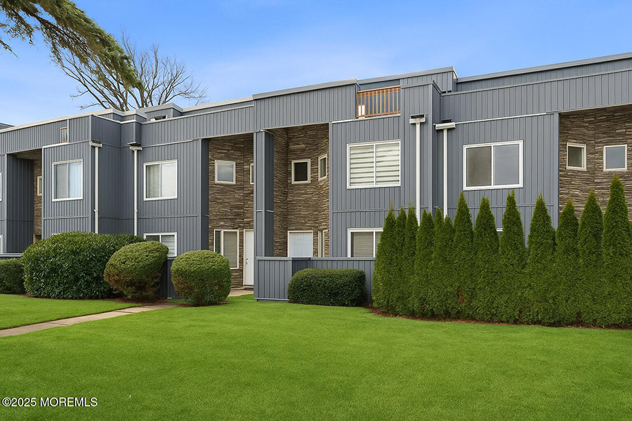 Townhome photograph from network marketing materials, used as illustrative artwork; not an available rental