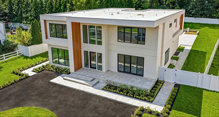 Modern home image from network marketing materials, used as website artwork; availability not represented